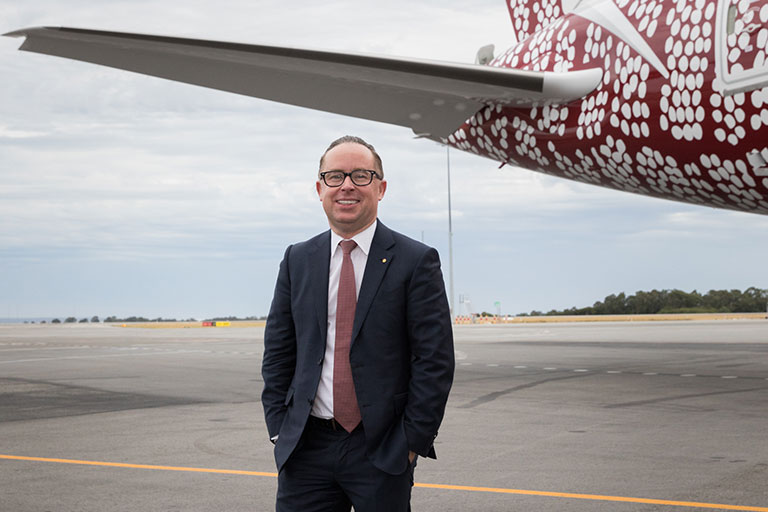 Qantas CEO brings forward his retirement